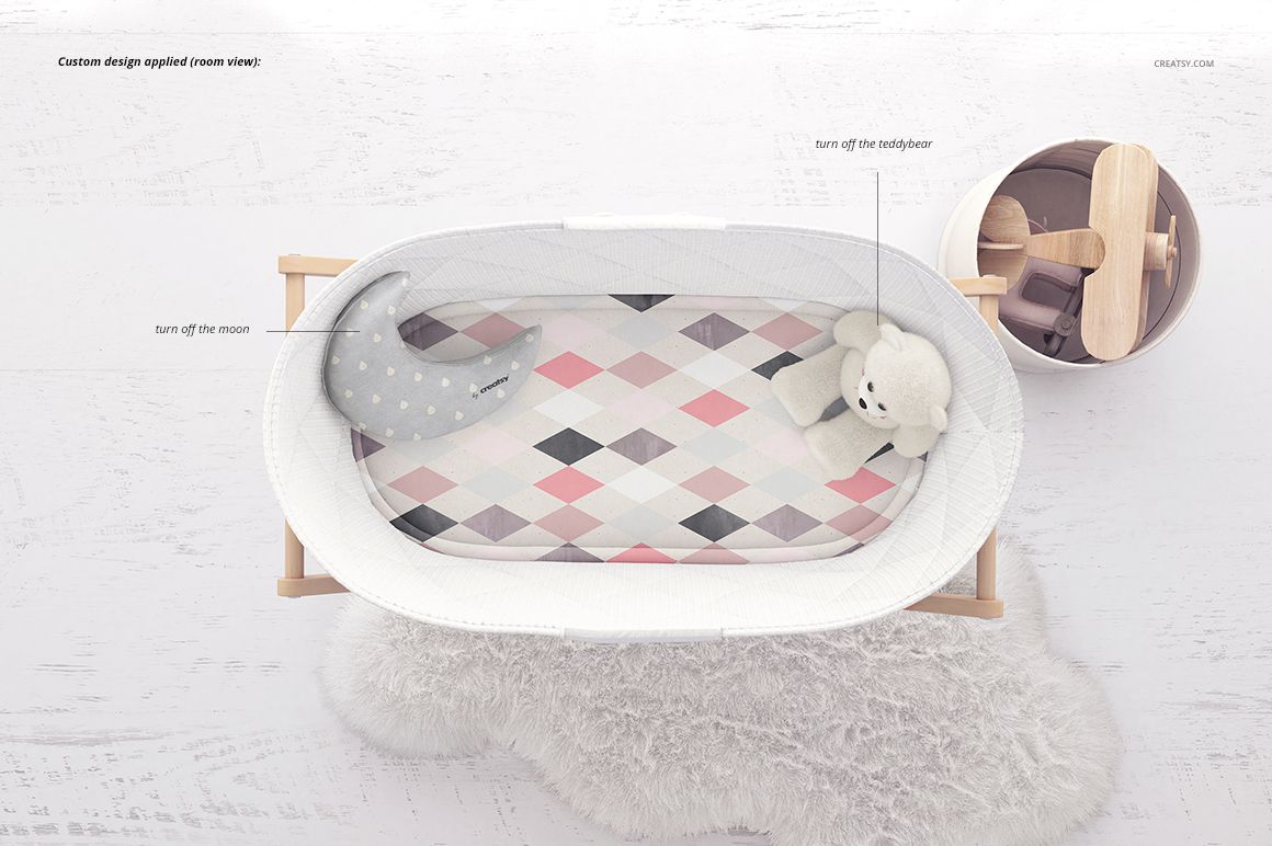 Bassinet liner mockup featuring a soft diamond pattern in pastel colors, shown inside a wooden bassinet from above.