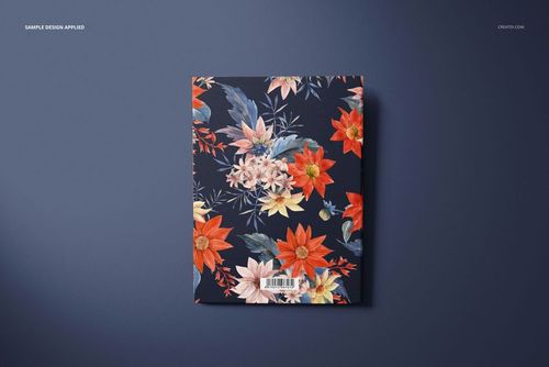 Stationery mockup featuring a rectangular clipboard with vibrant flower illustrations on a navy blue surface.