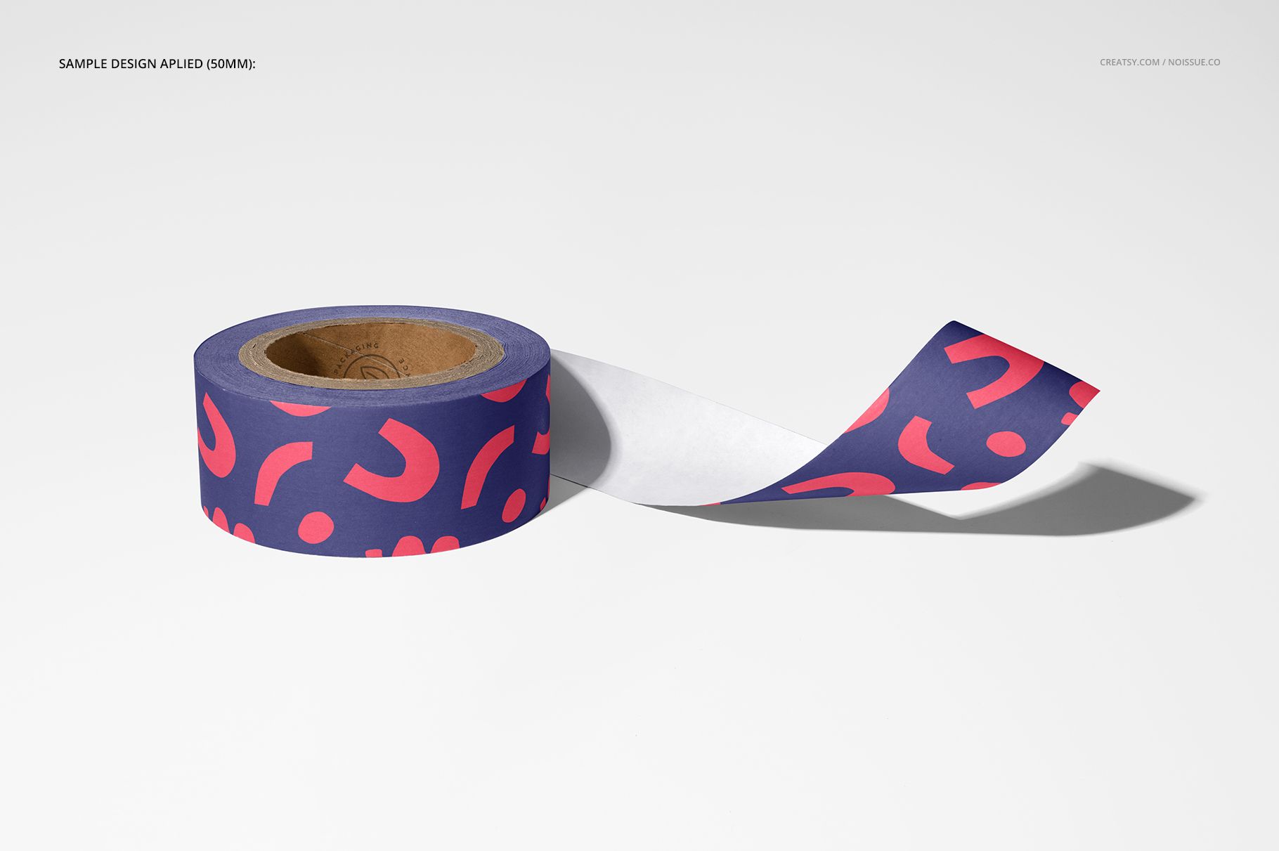 Mockup of a packing tape roll featuring a bold purple and pink abstract design, partially unrolled on a plain background.