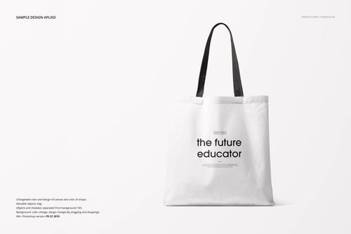 Front view of a white tote bag mockup with black straps and minimalist text in the center, set against white.