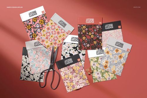 Fabric swatches mockup featuring various flower designs, laid out on a red surface with scissors included in the scene.