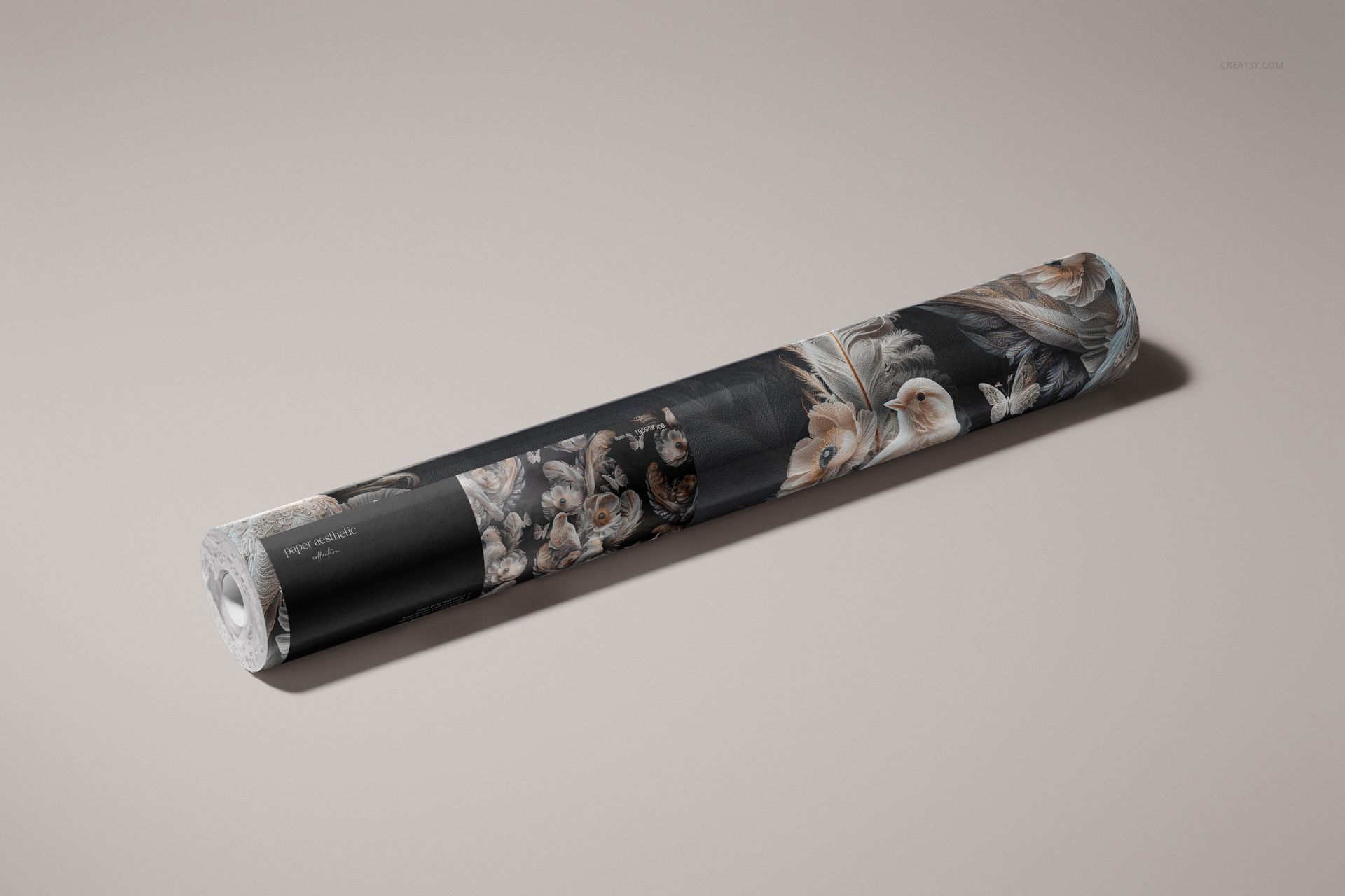 PSD mockup of a rolled wallpaper with intricate floral design in muted tones, placed on a beige background.