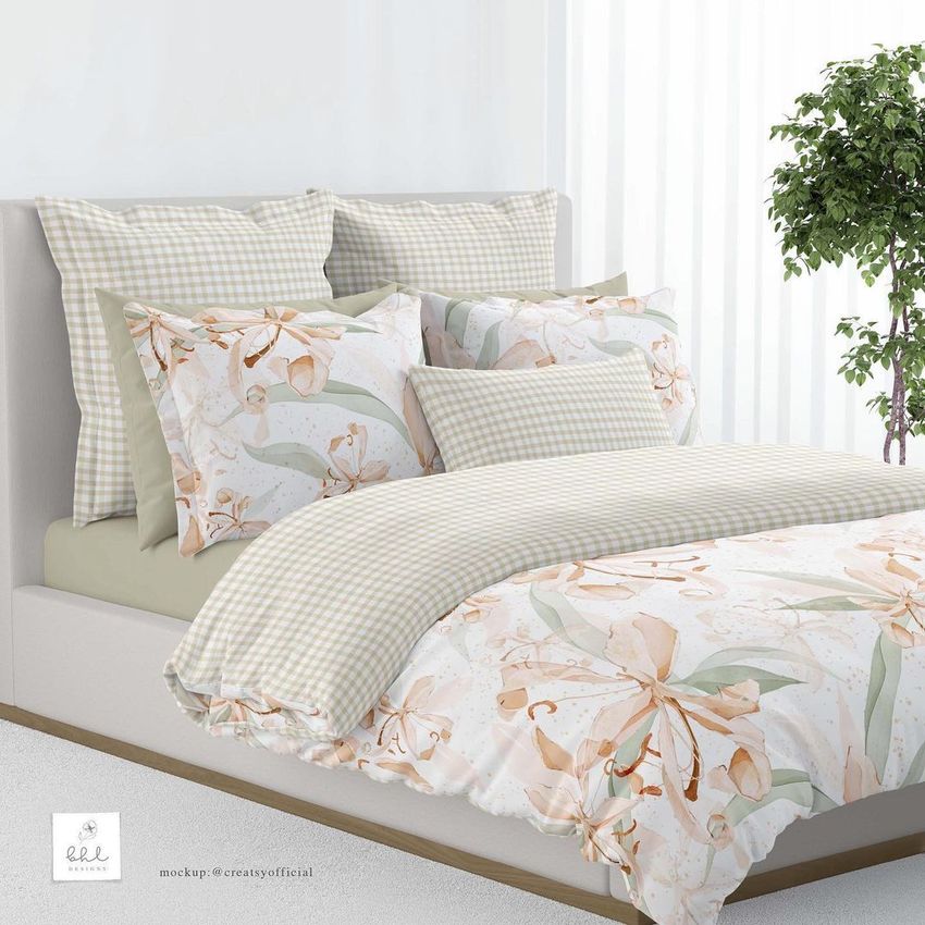 Bedding mockup featuring a neatly made bed with pillows and duvet in beige checkered and floral patterns, set in a bright bedroom.