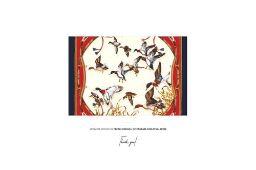 Front view of a silk scarf box mockup featuring a bird pattern on a cream background with red border accents.