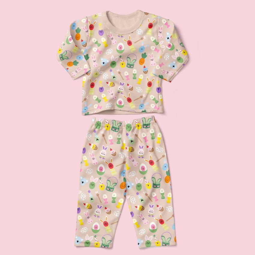 Baby long sleeve pyjama mockup featuring a matching top and pants with colorful Easter egg and bunny patterns on a pink background.