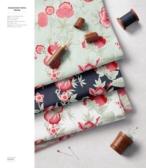 Stack of three cotton fabric pieces with floral patterns in pastel green, navy blue, and white, viewed from above.