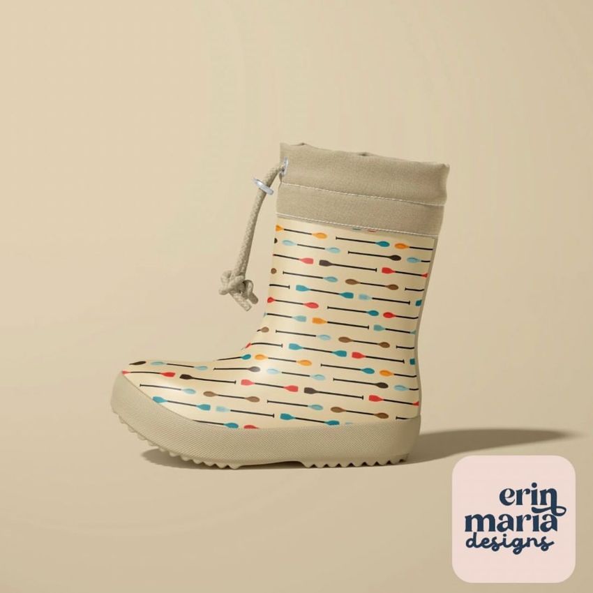 Rain boots mockup featuring a single beige boot with colorful abstract lines and dots, shown on a plain tan background.