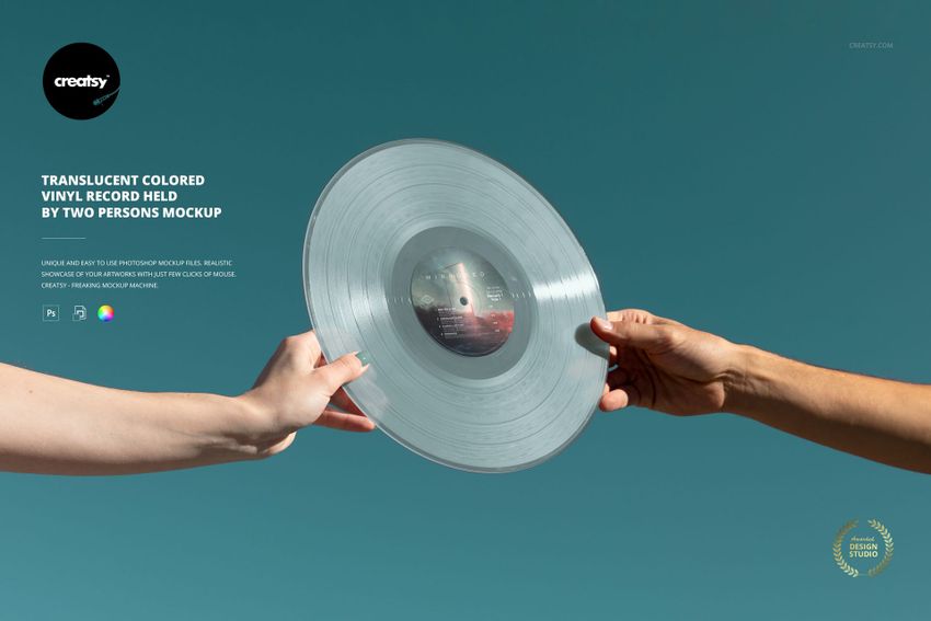 Translucent colored vinyl record held by two hands against a clear blue sky, shown in a front view mockup.