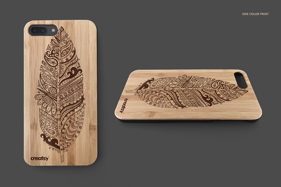 Mockup of a wooden phone case featuring a detailed feather pattern, displayed upright and lying flat.