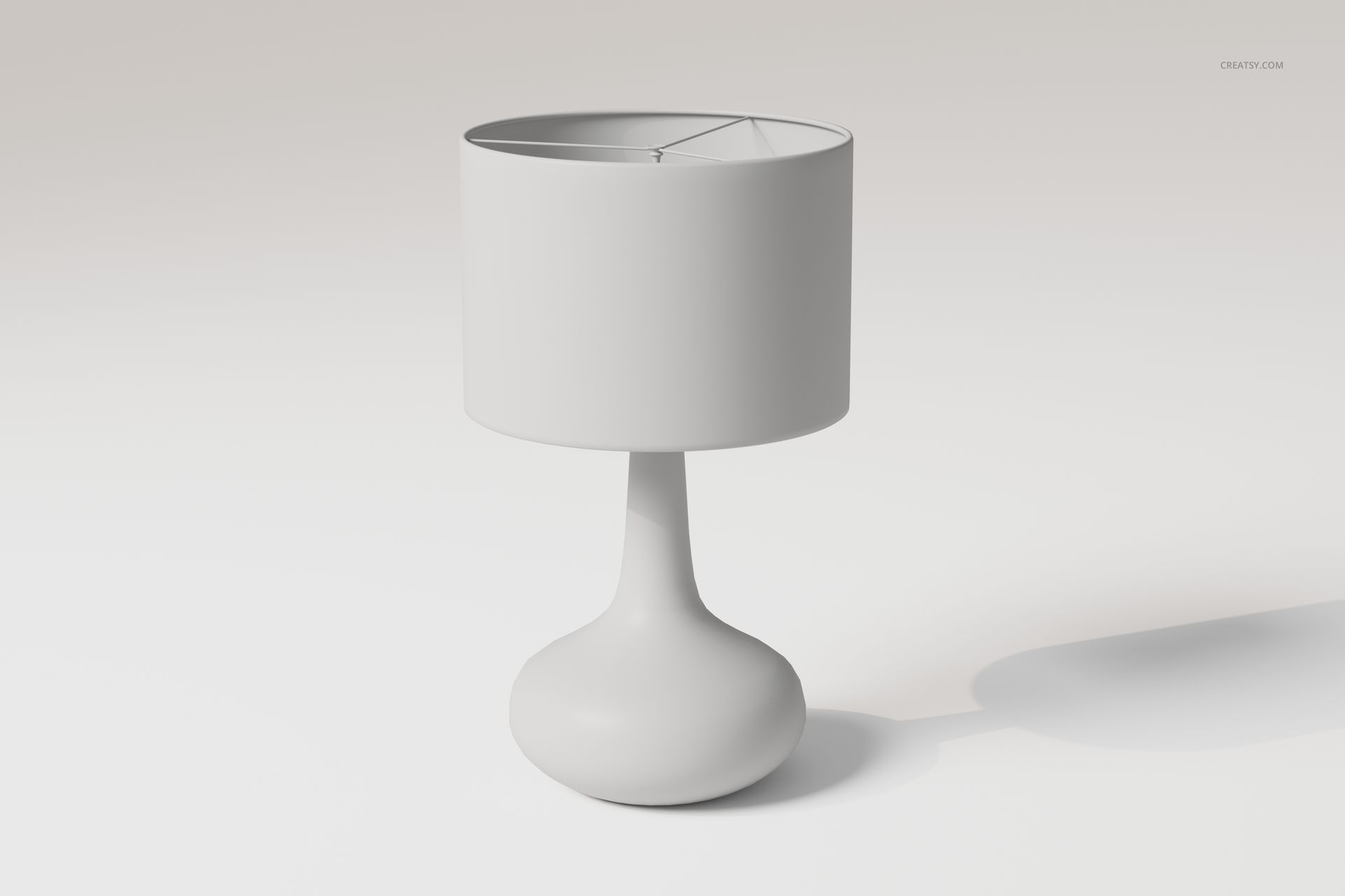 Modern bedside table lamp with a cylindrical shade and rounded base, shown in a neutral white color on a plain background.