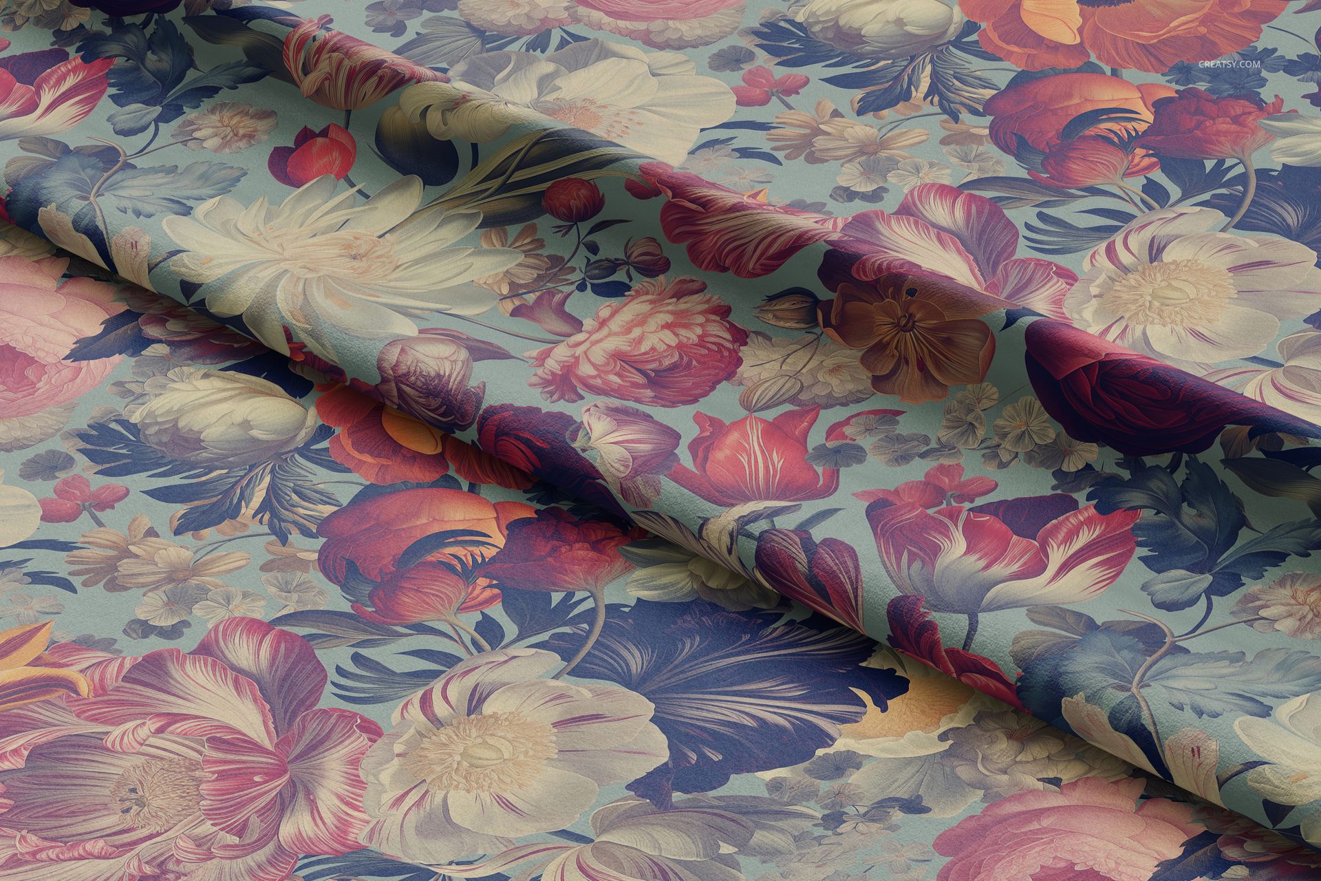 Detailed mockup of polyester velvet fabric featuring vibrant flowers in red, pink, and cream tones, viewed from above.