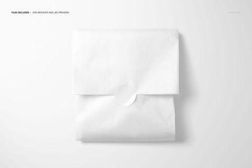 PSD mockup of a square tissue paper wrap featuring a simple white sticker, displayed on a clean background.
