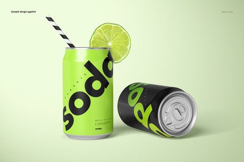 PSD mockup featuring two drink cans, one standing with a lime wedge and straw, the other can positioned horizontally.