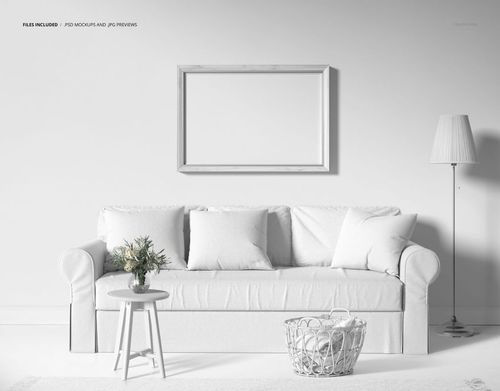 Front view of a skirted sofa with pillows in a neutral living room, featuring a framed wall mockup and minimal decor.
