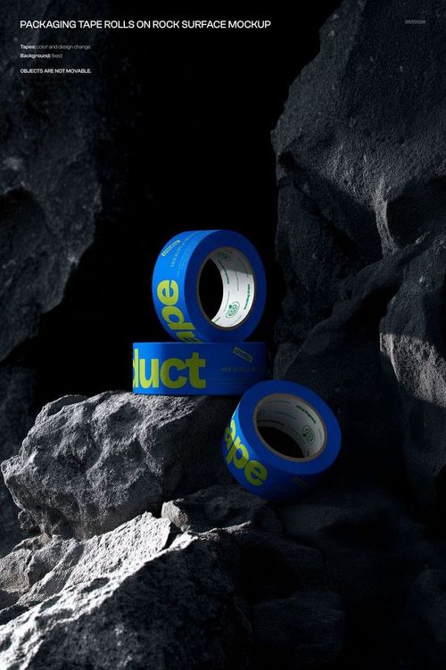 A set of blue and yellow branded tape rolls is displayed on uneven stone surfaces, highlighting the mockup’s realistic details.