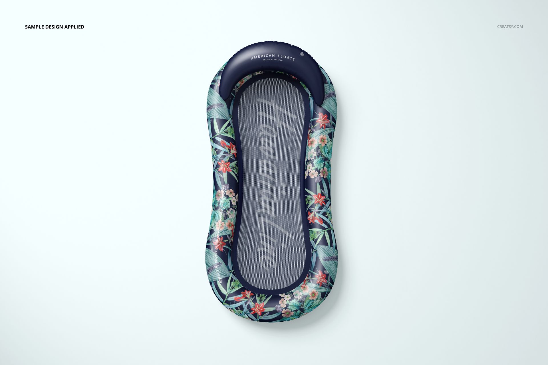 Top view of a pool lounger float mockup featuring dark edges with colorful tropical leaves and flowers.