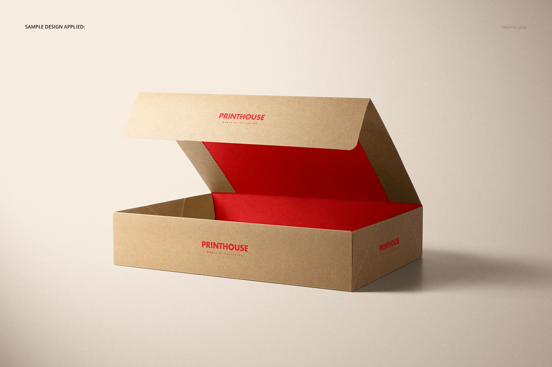 Rectangular kraft packaging box mockup with red inner lining, lid open, presented in a minimalist setting.