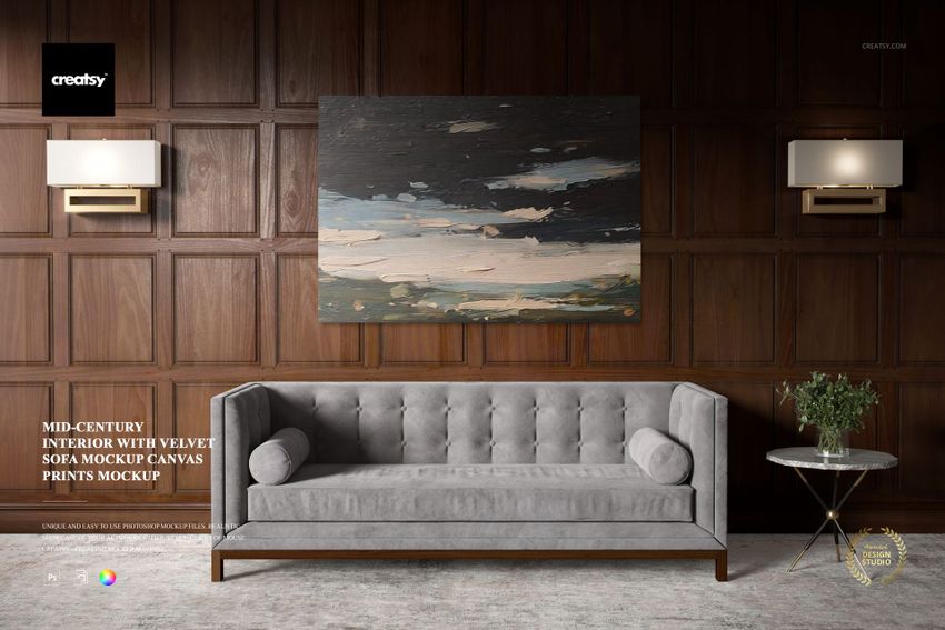 PSD mockup of a stylish living room scene showing a velvet sofa, large canvas art, wood paneling, and a round side table with a plant.