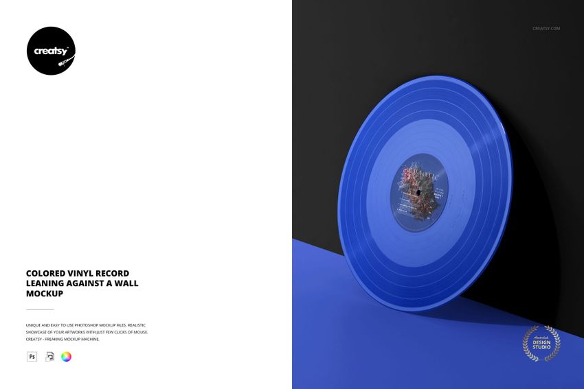 Colored vinyl record mockup featuring a blue disc resting upright against a purple wall and floor background.