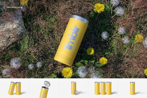 Yellow 22oz skinny tumbler with silver lid lying on grass among dandelions, shown from a top view perspective.