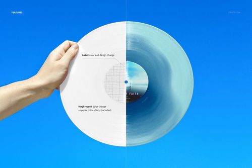 Close-up of a vinyl record mockup held in a hand, featuring two-tone color and Mediterranean landscape in background.