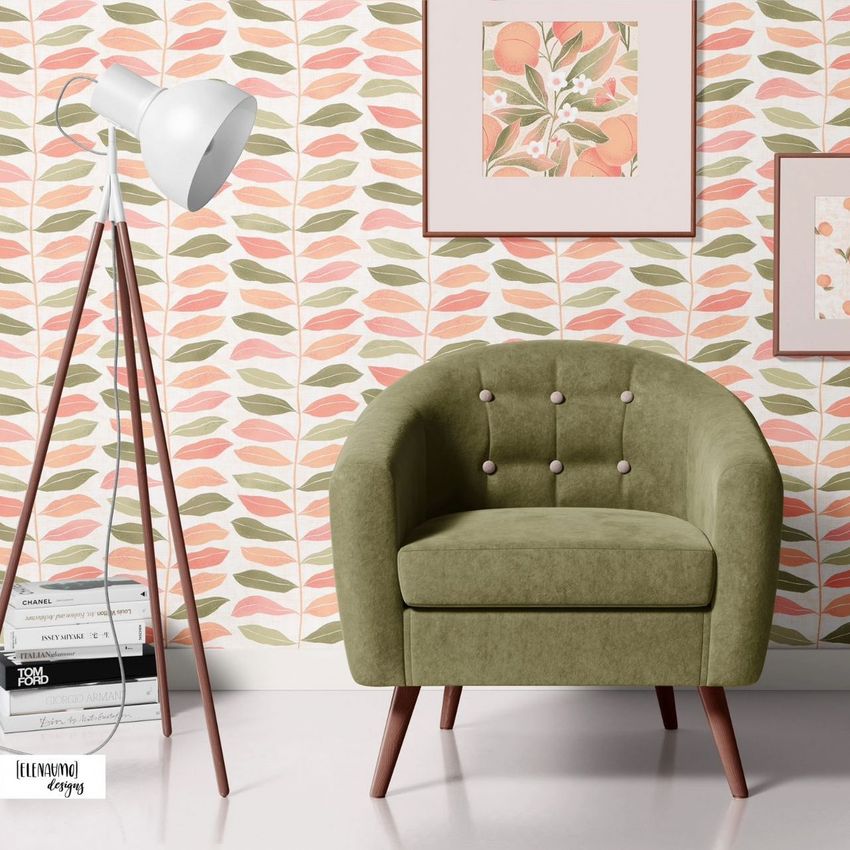 Interior scene mockup featuring a green armchair on wooden legs, a tripod floor lamp, and a leafy wallpaper with peach and pink tones.