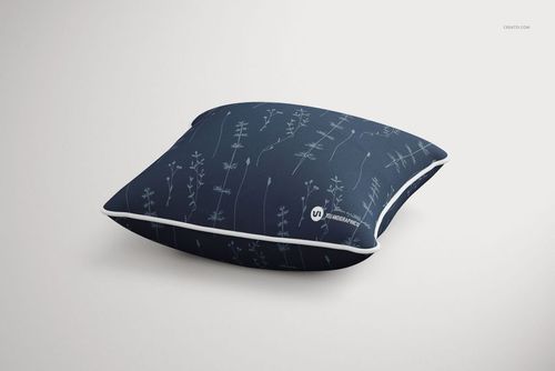 Square cushion mockup with dark blue fabric, white piping, and minimalist floral design, isolated on a neutral background.