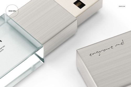 Front angle of acrylic USB drive mockup showing metallic finish, clear acrylic end, and engraved surface detail.