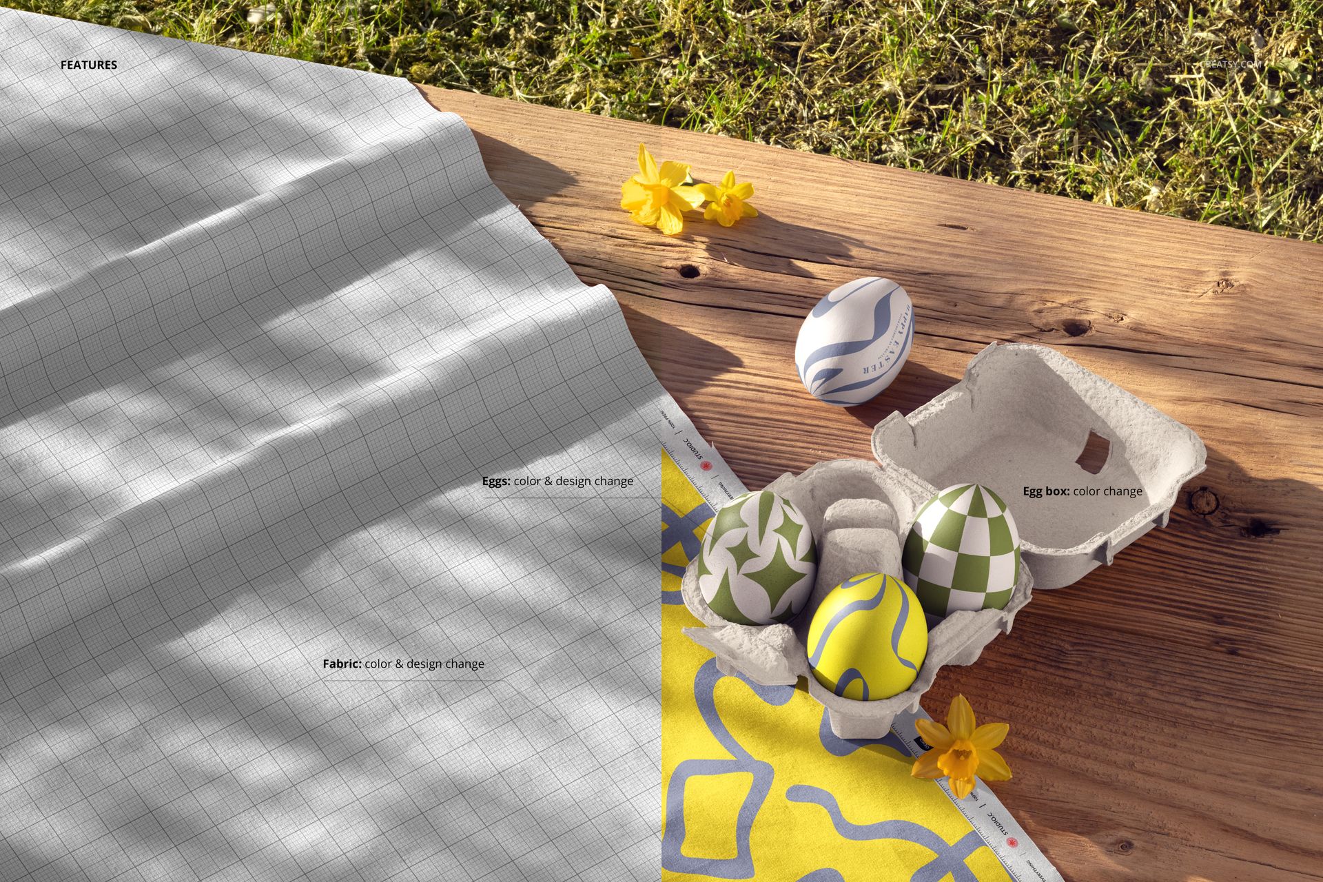 Cotton fabric mockup with a grid pattern displayed on a wooden surface, next to Easter eggs and yellow flowers outdoors.