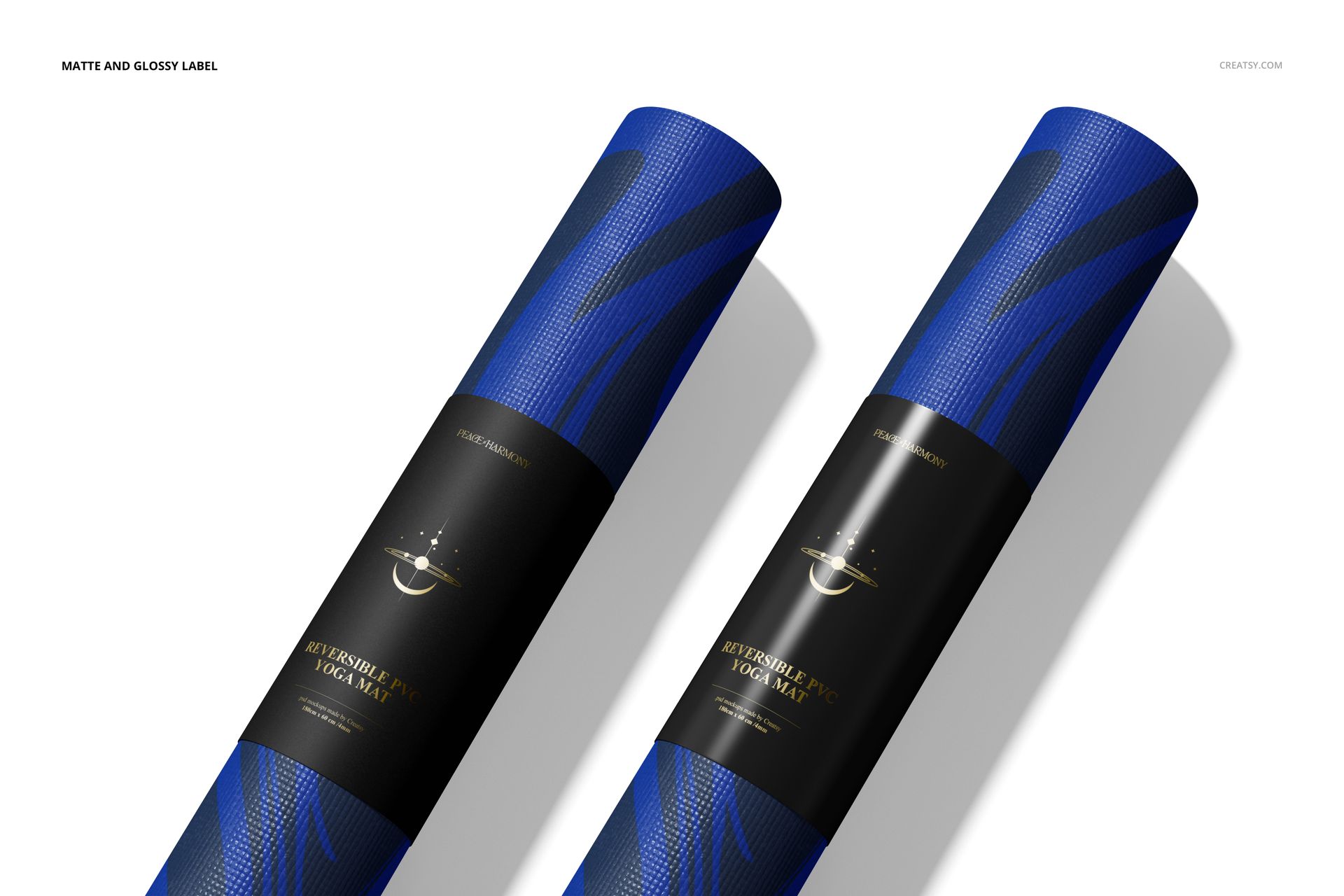PSD mockup of two blue yoga mats with black and gold labels, viewed from above with strong lighting and shadows.