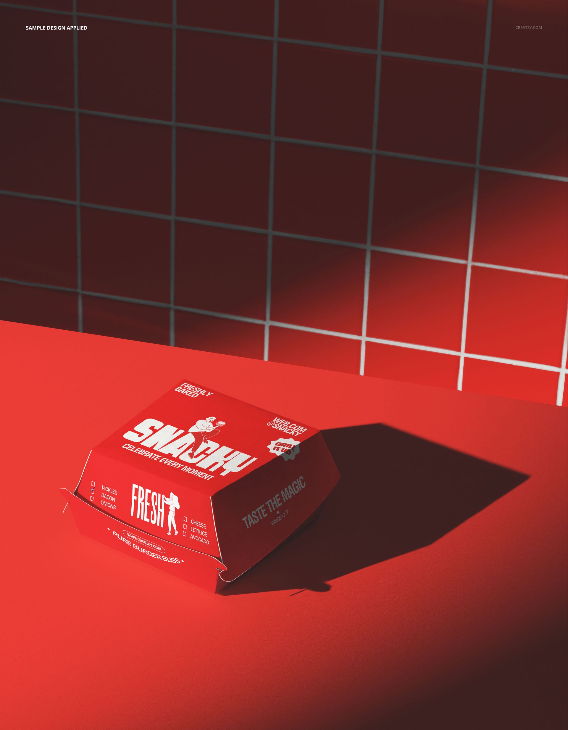 Burger box packaging mockup in bright red color, shown in a three-quarter view on a red surface with tiled wall background.