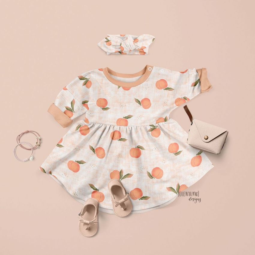 Baby jersey dress mockup with peach pattern, matching headband, small purse, bracelets, and shoes on a beige background.