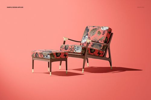 Mockup of a lounge chair and ottoman featuring botanical fabric design, set against a solid coral backdrop.