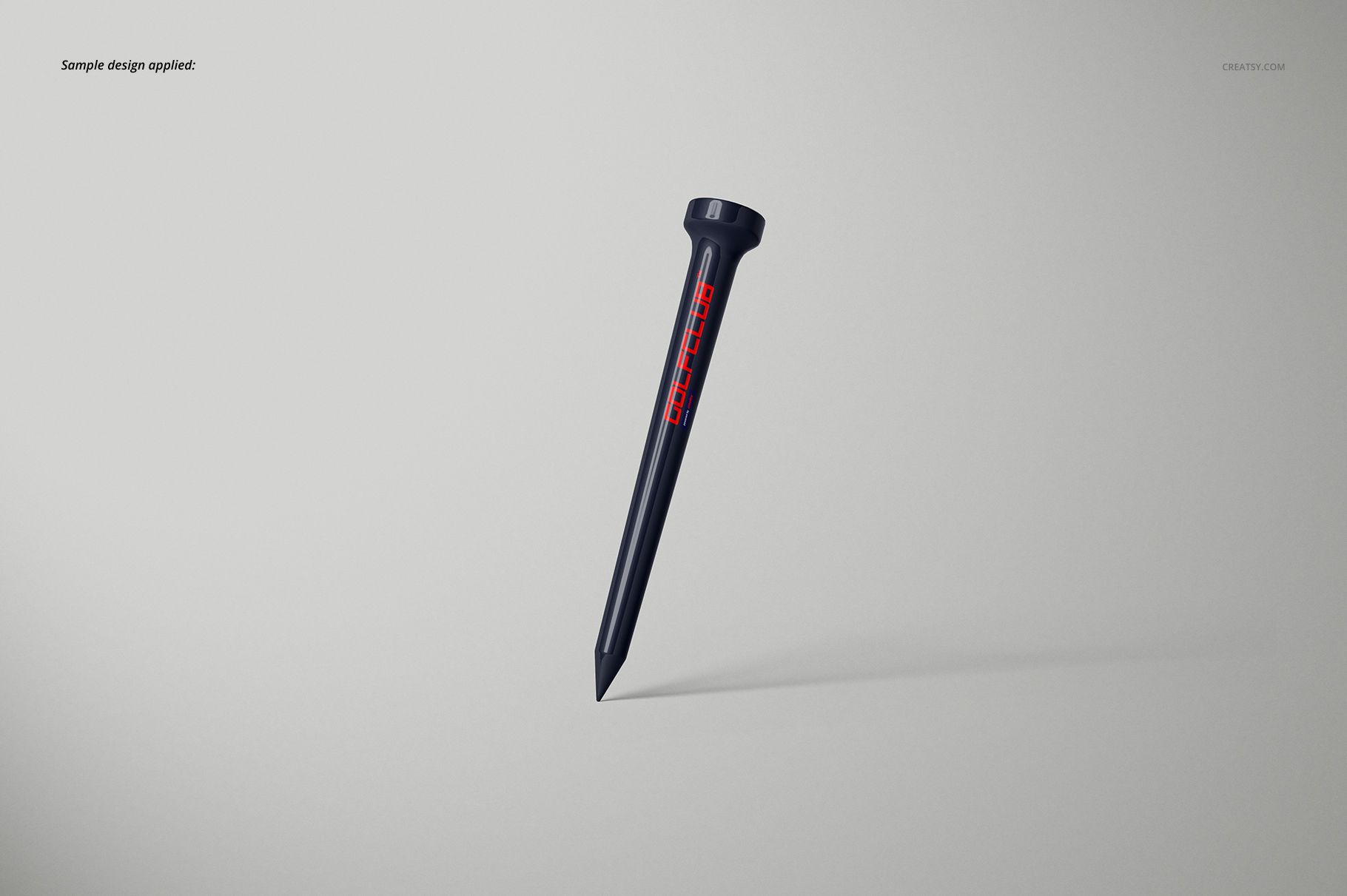 Golf tee mockup featuring a dark color and red lettering, isolated against a plain light gray backdrop.