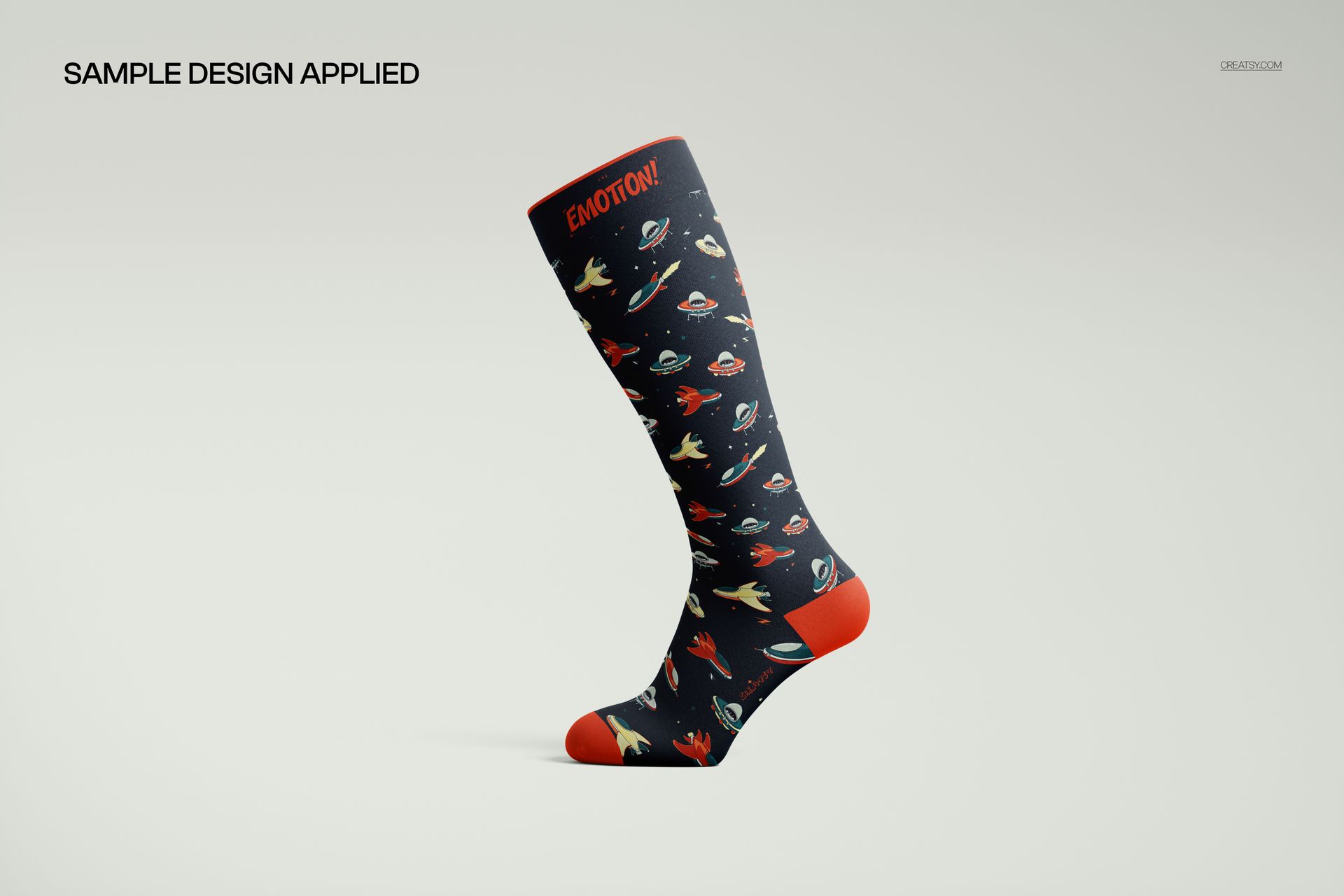 Over the calf sock mockup featuring a space-themed pattern with planets and rockets, side view on a light background.