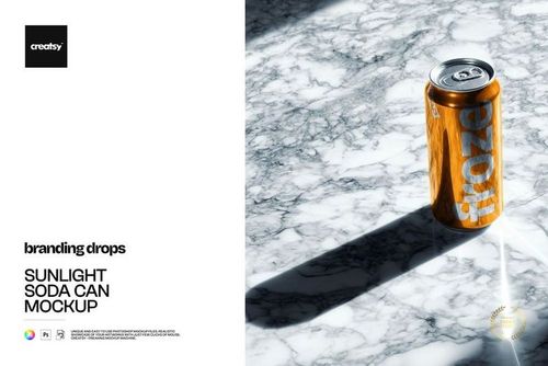 Sunlight shines on a mockup of an orange soda can with silver text, placed on a marble tabletop with dramatic shadows.