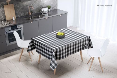Black and white checkered tablecloth mockup displayed on a rectangular kitchen table with two white chairs.