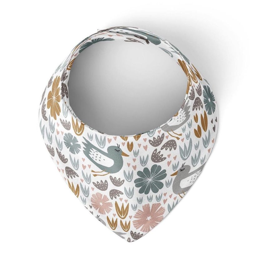 Baby bandana bib mockup featuring a bird and floral pattern in muted pastel colors, shown from a top-down perspective on a white background.