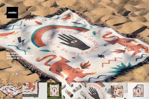 Fringed woven throw blanket mockup featuring geometric and hand patterns in earthy tones, shown on sand.