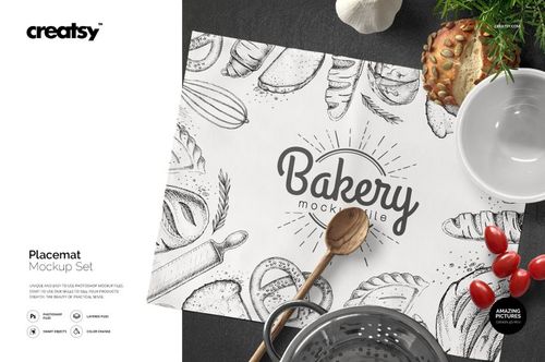 Placemat mockup featuring hand-drawn bread and pastry sketches, displayed flat with tableware and food props.