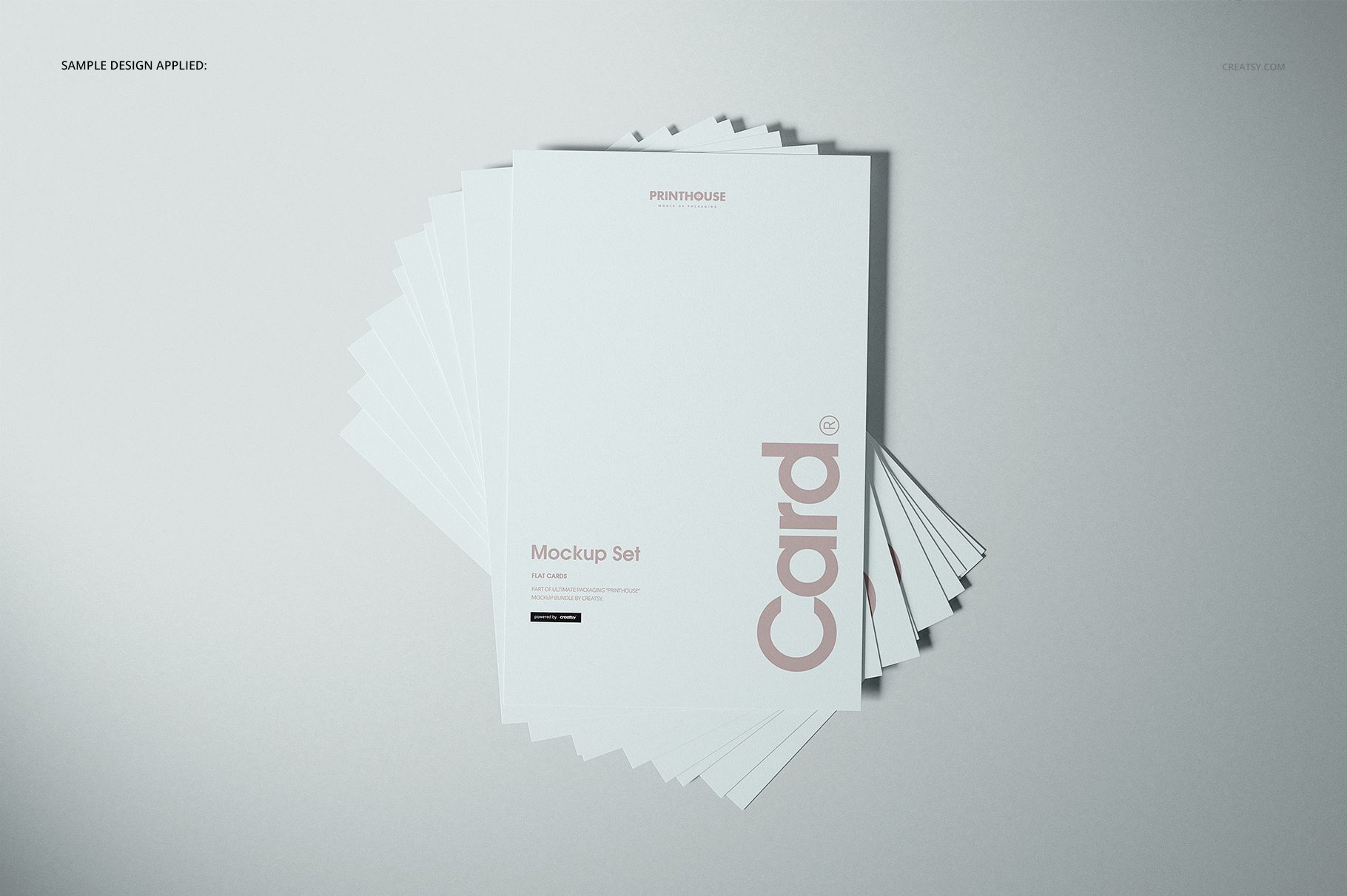 Flat cards mockup set featuring a stack of rectangular white cards with minimal text, viewed from above on a light surface.