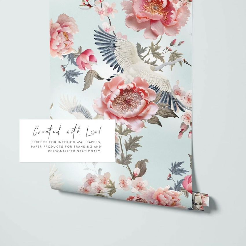 Paper wallpaper mockup featuring a floral and crane pattern in pink and gray tones, displayed against a light background.