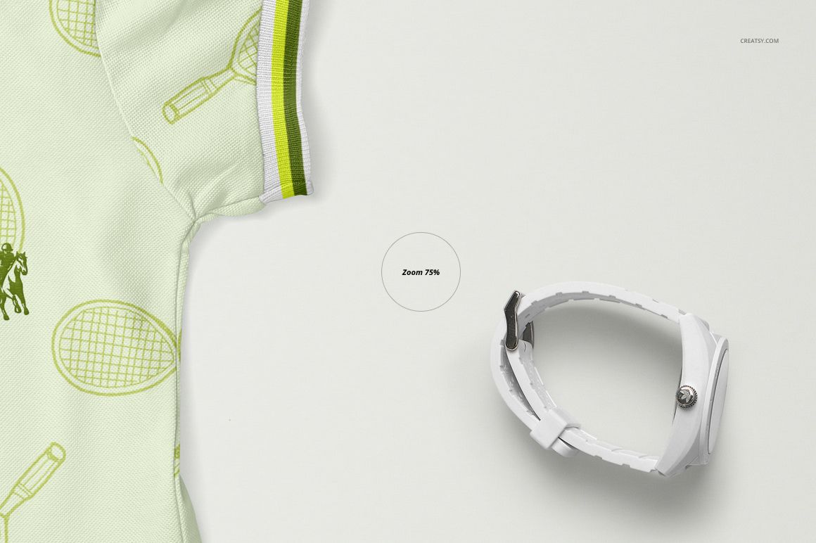 Front view of a kids polo dress mockup with light green fabric and tennis racket pattern, next to a white wristwatch.