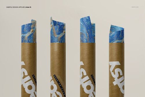PSD mockup of brown packaging tubes with visible blue patterned paper, arranged side by side on a pale backdrop.