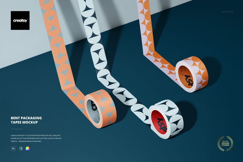 Bent packaging tapes mockup showing two patterned rolls, orange and white, displayed on a flat blue background.