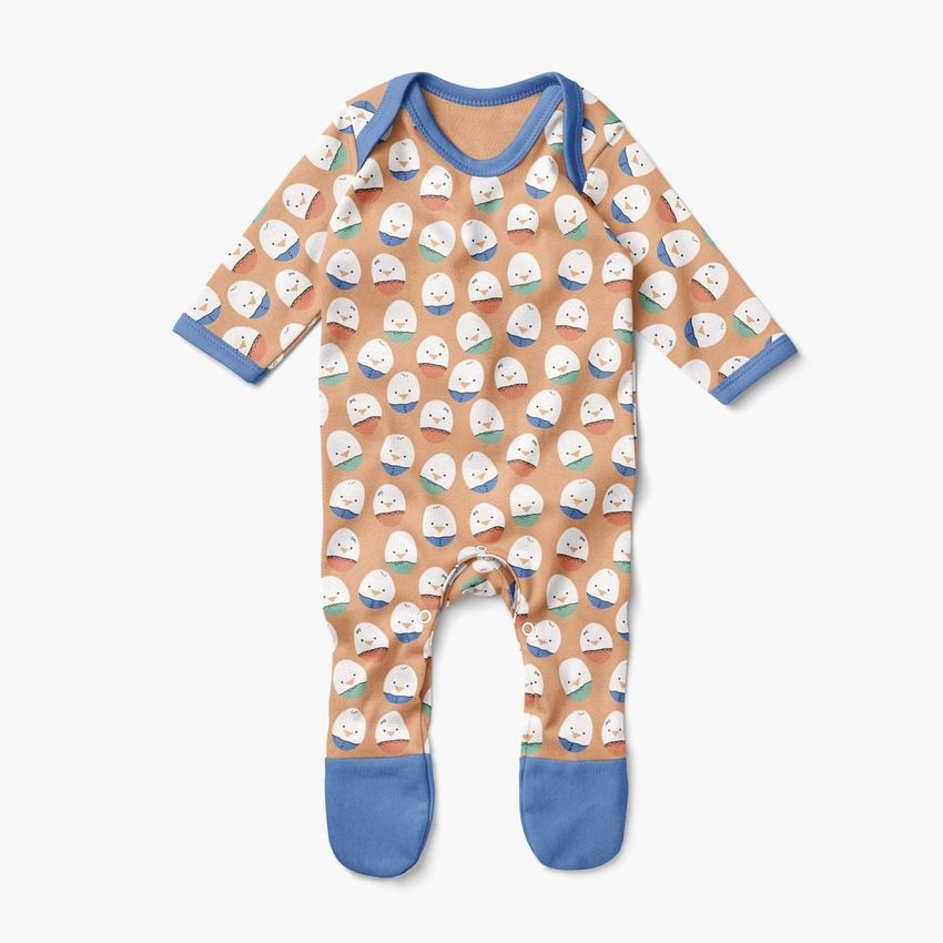 Baby chest rompersuit mockup featuring a playful Easter eggs pattern in pastel colors with blue trim on a white background.