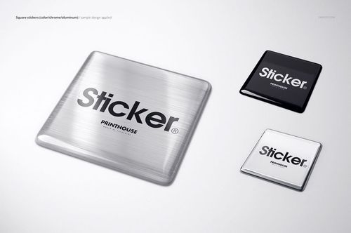 Mockup of three metallic square stickers with epoxy dome finish in silver, black, and white, top view.