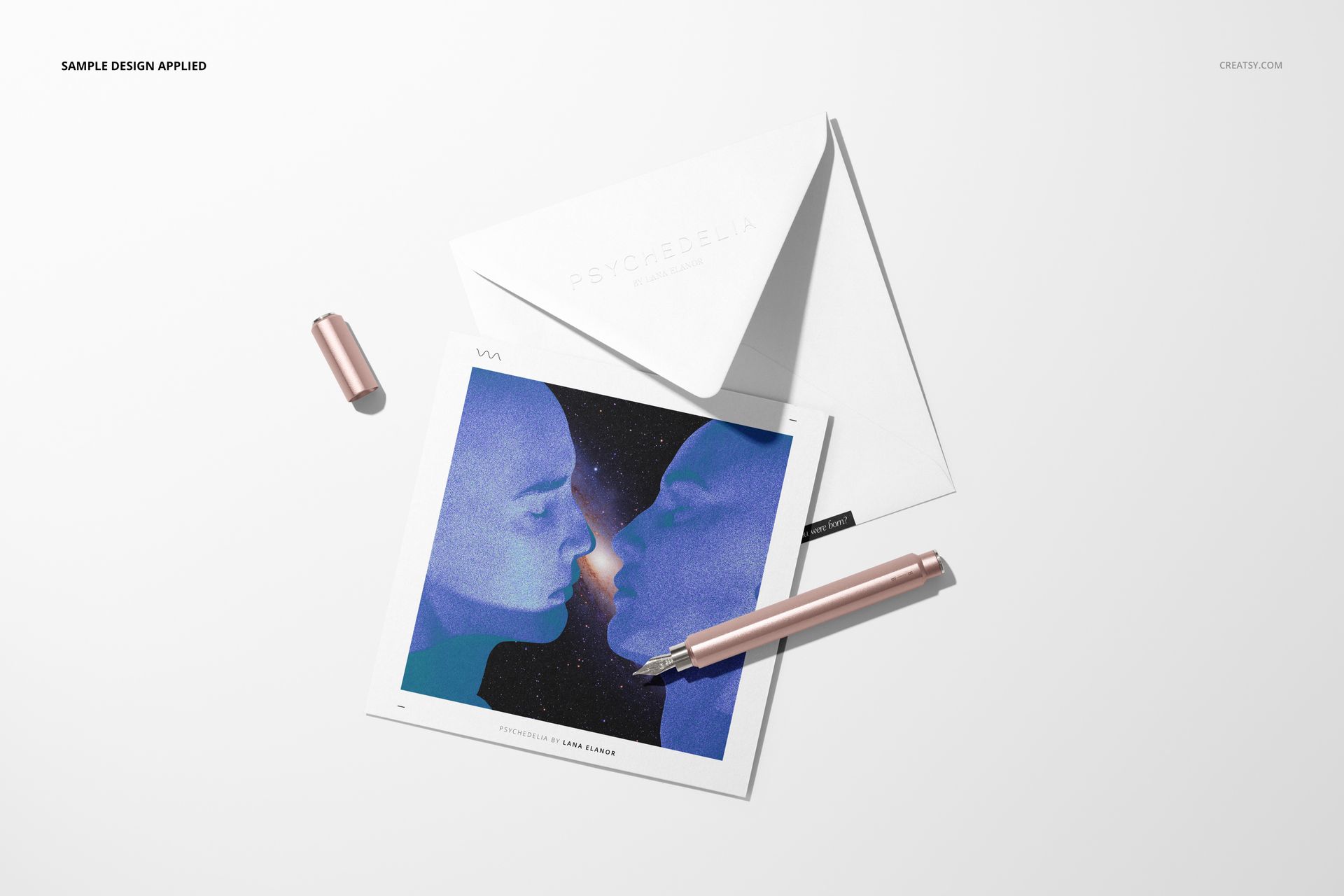 Square card and envelope mockup set displayed on a white surface, featuring a metallic pen and abstract artwork.