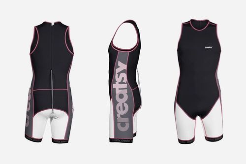 PSD mockup showing a trisuit from three angles, highlighting black and white color blocks and pink trim details.