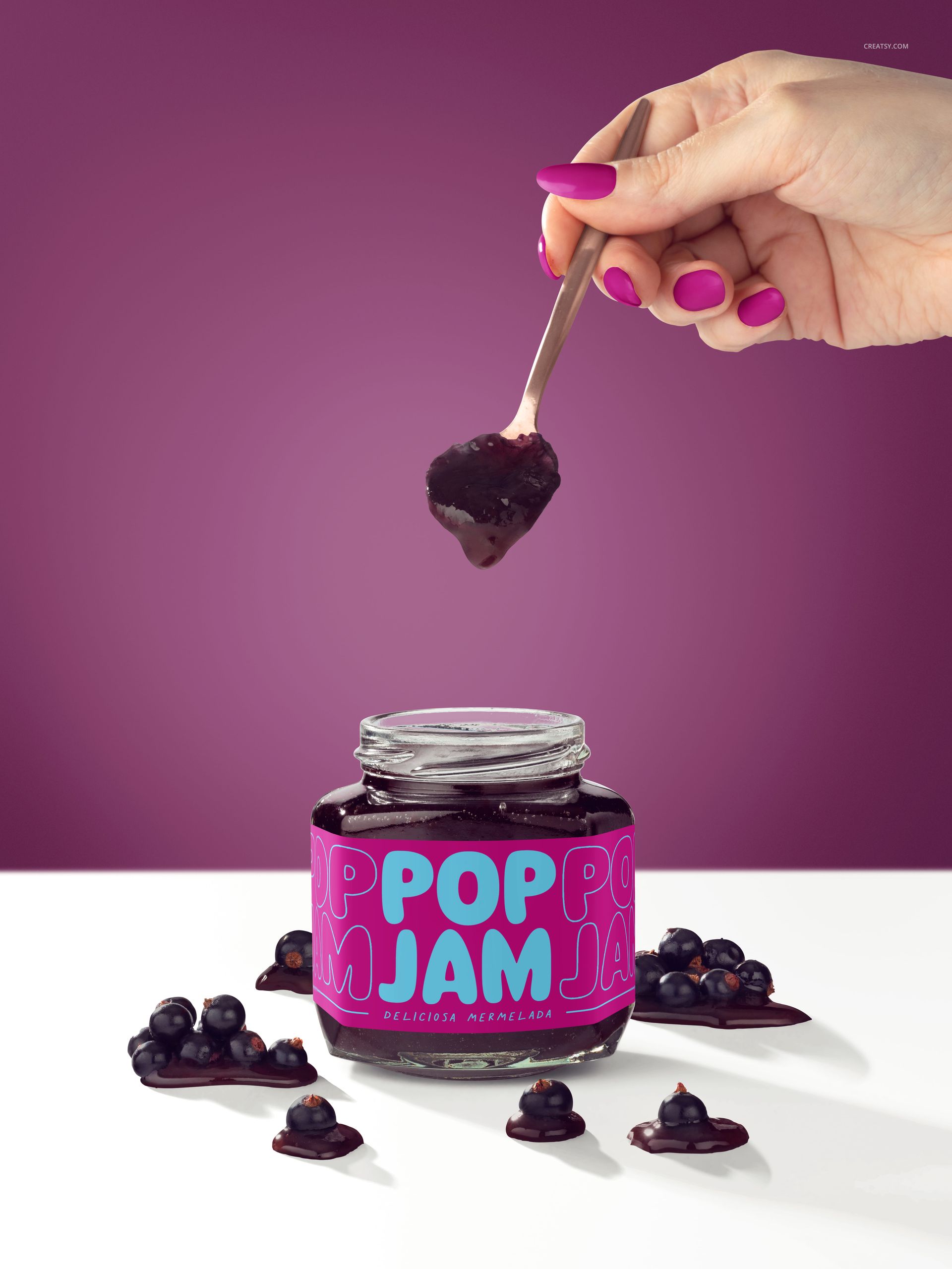 Blackcurrant jam jar PSD mockup on white table, open lid, spoon with jam held above, berries and jam scattered around.
